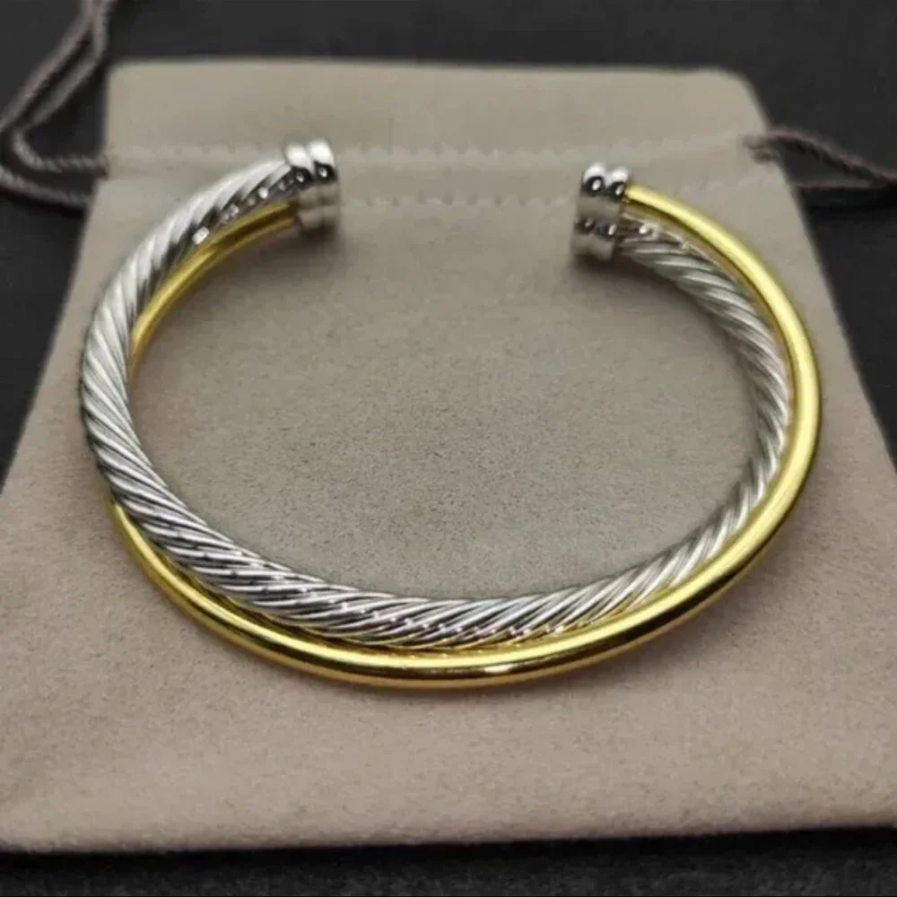 CROSSOVER TWO ROW CUFF BRACELET
Sterling Silver w/18K Yellow Gold, 5mm, Sz Med - Picture 2 of 3